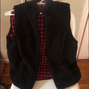 Black furry sleeveless jacket